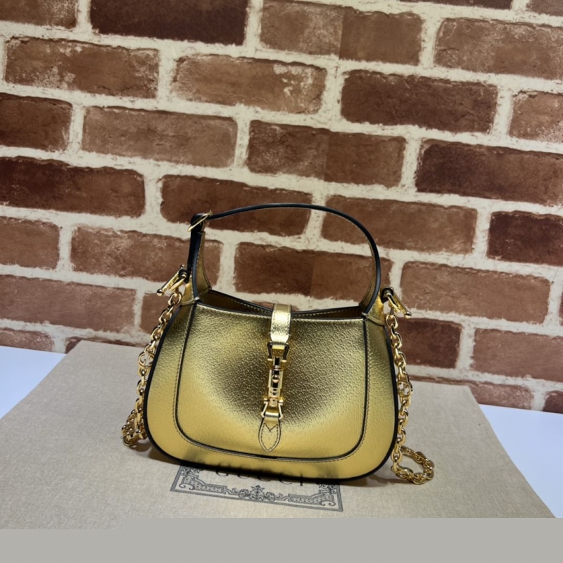 G*u*i top handle bags